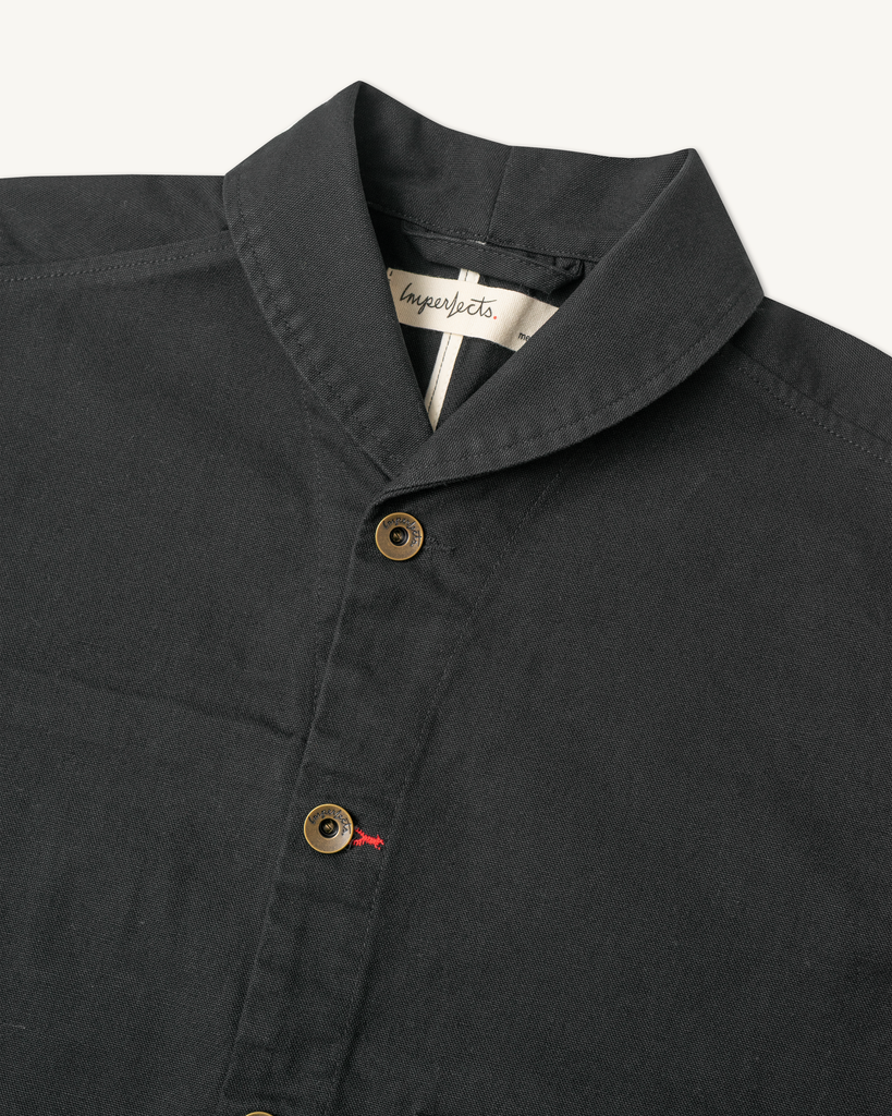 The Shepherds Shirt is a silhouette born of the joining of a family favorite vintage Kimono and a 1920’s French field shirt. This piece has a Kimono style lip collar, French split side seams, and Corozo Buttons. It is finished with a heavy stone wash for effect and comfort and has a refined crop in the sleeves so you can be sure to easily check your timepiece.

Detail

9.2oz, 100% Organic Cotton Canvas
Durable Brass Tack Buttons
Triple Pocketing - One &nbsp;Internal Drop-In Pocket, One External w/ Hidden Co