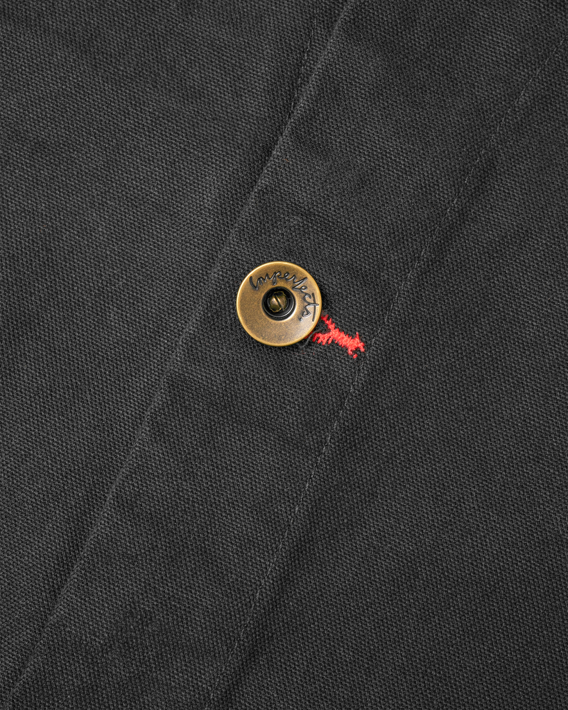 The Shepherds Shirt is a silhouette born of the joining of a family favorite vintage Kimono and a 1920’s French field shirt. This piece has a Kimono style lip collar, French split side seams, and Corozo Buttons. It is finished with a heavy stone wash for effect and comfort and has a refined crop in the sleeves so you can be sure to easily check your timepiece.

Detail

9.2oz, 100% Organic Cotton Canvas
Durable Brass Tack Buttons
Triple Pocketing - One &nbsp;Internal Drop-In Pocket, One External w/ Hidden Co