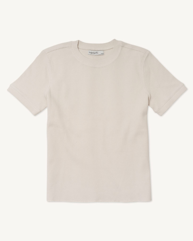 Flat lay of the Waffle Crew in Natural, made with heavyweight waffle knit cotton, raw edge cover-stitched hem, and ribbed collar and cuffs.